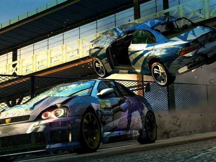 The "Burnout" series nails the feeling of high-speed driving better than any other game, and "Burnout Paradise" is the best possible example.