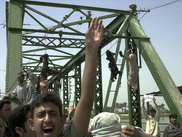 In March 2004, a few months after Saddam Hussein was captured near Tikrit, four Blackwater contractors were killed and hung by insurgents from a bridge in Fallujah.