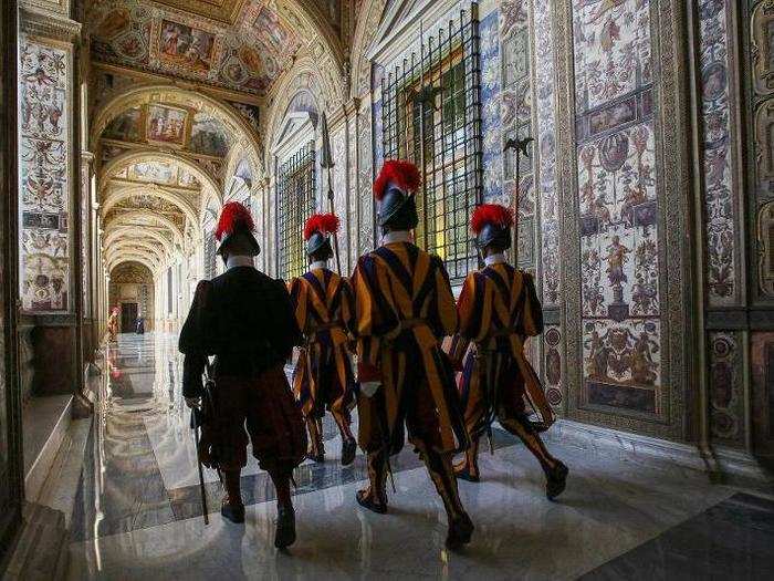 The Swiss Guard closely patrol the Apostolic Palace. The smallest army in the world, they have served as the mercenary soldiers of the Holy See since 1506.