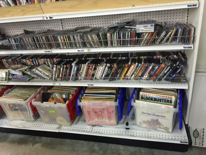 A CD or vinyl record at a thrift store