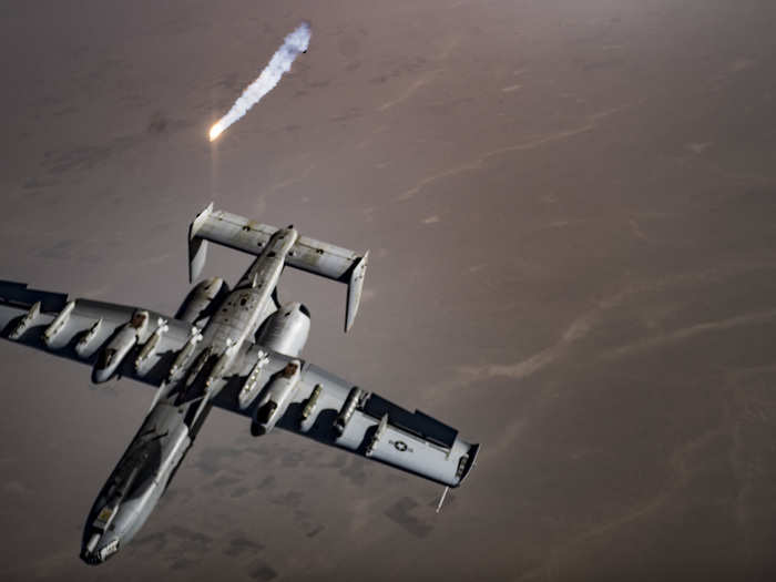 Once refueled, the A-10 inverts away and launches flares.