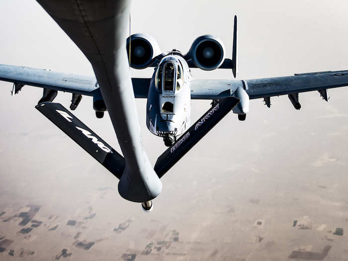 Once in position, the KC-135 extends the refueling boom down towards the Warthog.