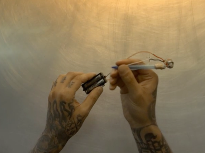 Many inmates got tattoos during their stint behind bars. They made tattoo machines with the battery pack and motor from a Walkman, rubber bands, paper clips, and a pen.