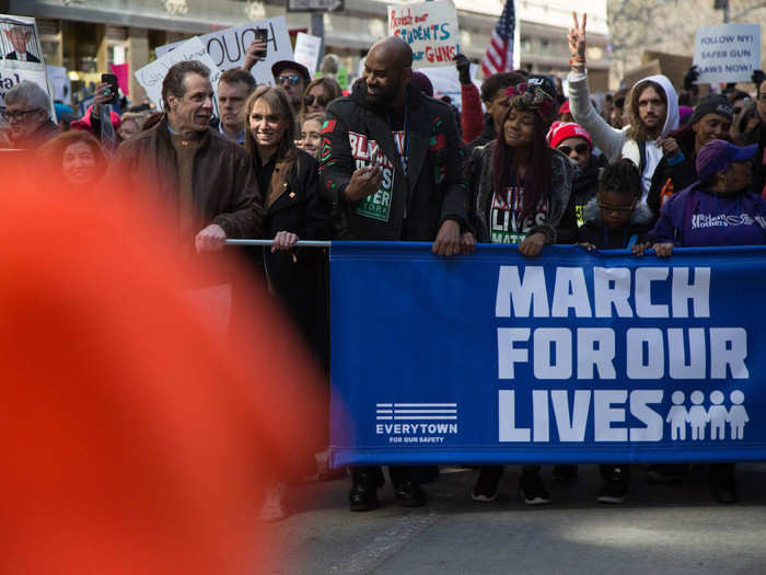 Newsome was seen marching next to Cuomo nearly the entire time.