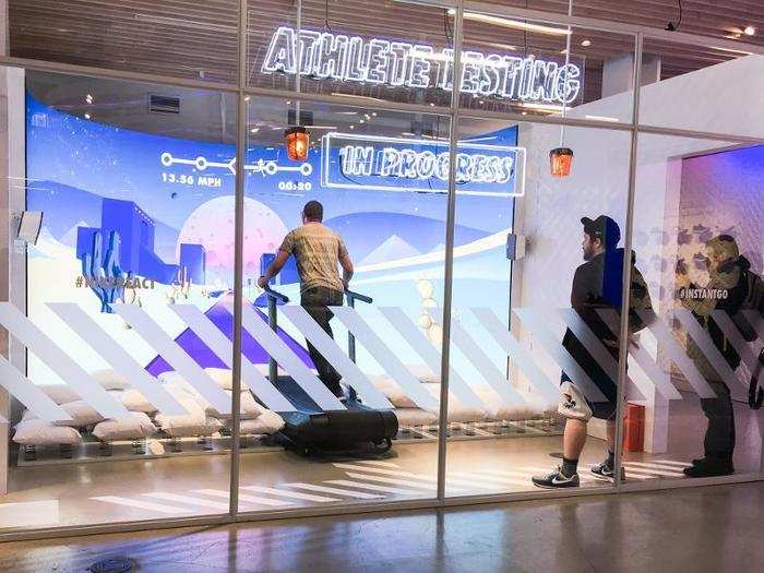 ... but the main focus was the "Athlete Testing" center, which had a treadmill surrounded by pillows, allowing shoppers to try on shoes and go for a run to test them out. People started to gather around, and there were people lined up, waiting to go for a run.