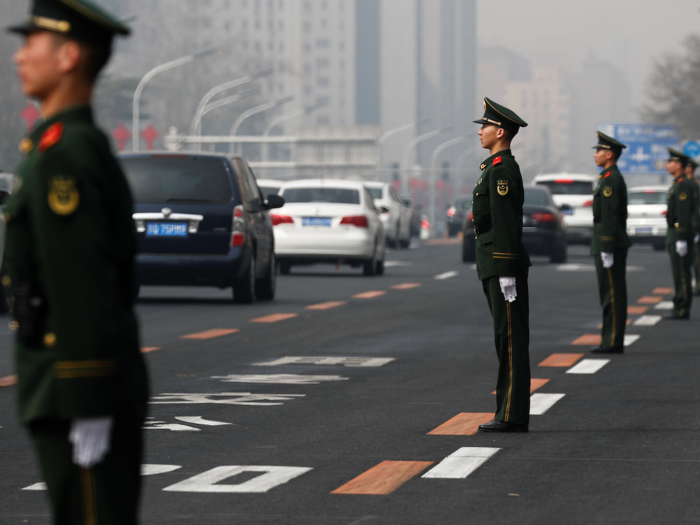 The streets were lined with security personnel, especially on Tuesday, when the mysterious delegation left Beijing.