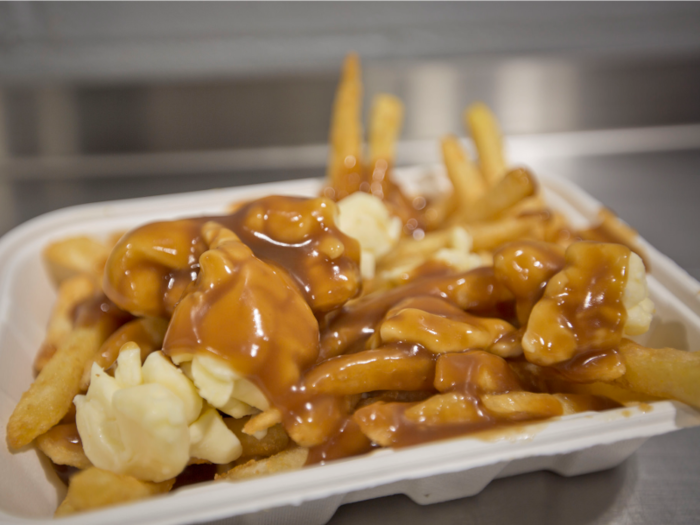 Chicken strips and hamburgers are on the menu at certain Canadian Costcos. And French fries topped with poutine are also an option.