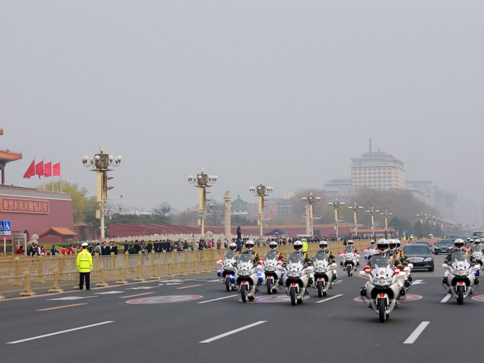 Here are more police officers on motorbikes next to Tiananmen Square. We don