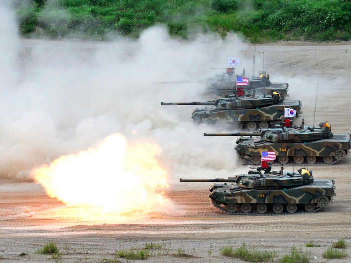 South Korean K1 tanks unleash rounds at the fire training field.