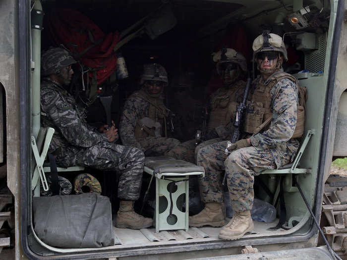 US Marines and South Korean soldiers await further orders inside their armored vehicle, during a joint combat training exercise.