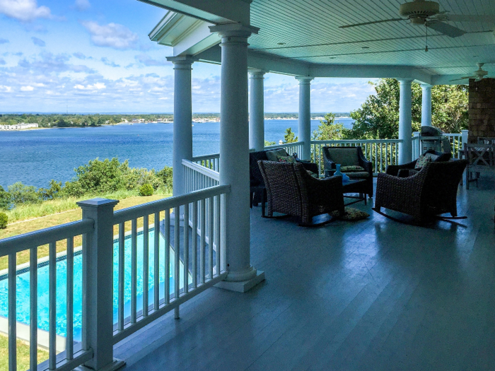 Restored since its 19th century heyday, this 4-story Queen Anne-style estate boasts more than 7,000 square feet of living space, plus spacious wraparound terraces. The property is elevated on the water side and a series of stairways lead directly to the sand.