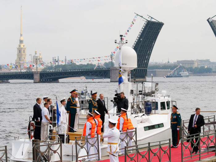 Festivities usually start with Russian President Vladimir Putin boarding a small boat to inspect the assembled fleet.