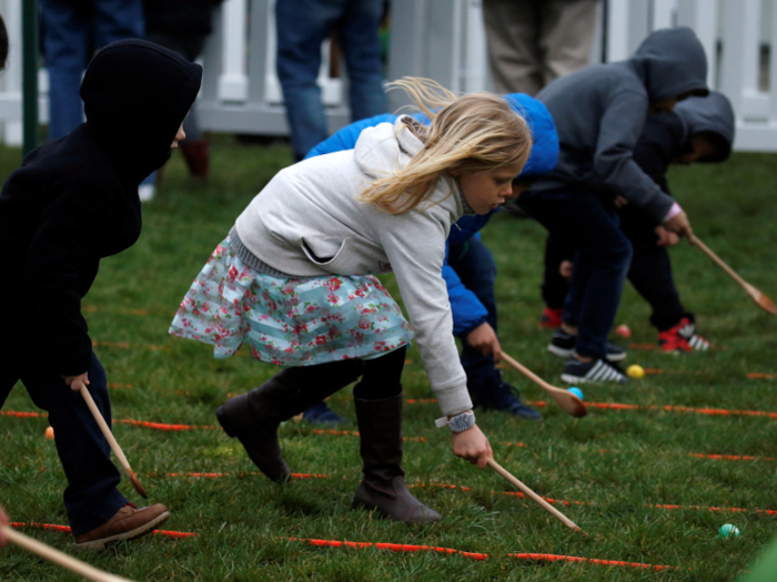 Then the children were off to the races. The goal of the Easter egg roll is to become the first to roll your egg past the finish line.