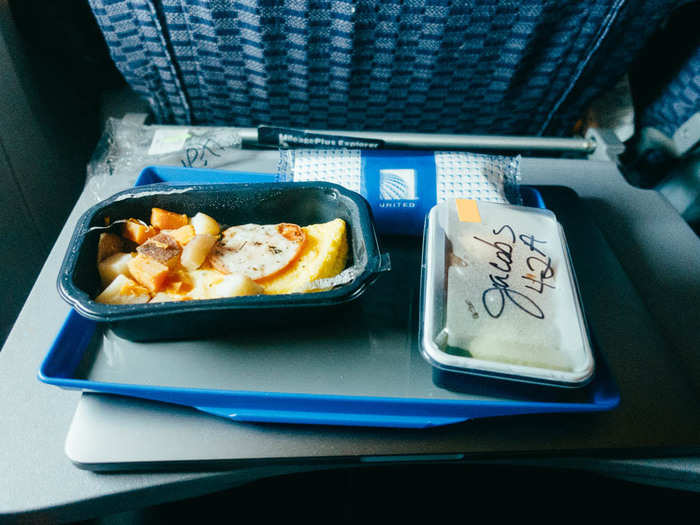 I finally lucked out at breakfast with a tasty vegetable omelette and some fresh fruit. I must say three meals on a 16-hour flight, plus copious snacks was pretty good to me. I was full the entire flight.