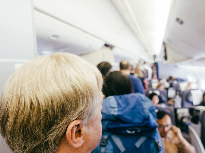 Despite boarding late, the walkway was still log-jammed all the way to the entrance. This was no doubt due to the fact that every passenger was trying to stow a carry-on. Perhaps one day airlines will come to their senses about the situation they