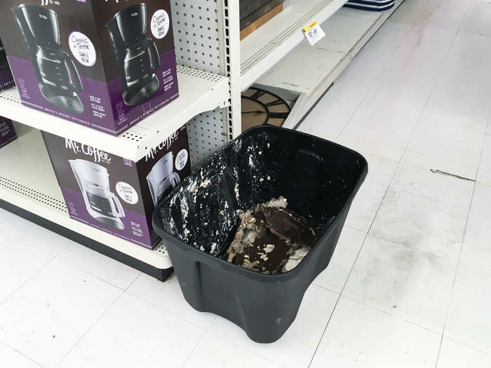 ... and this gross bucket was just sitting in the aisle. The floors all around were chipped and stained.