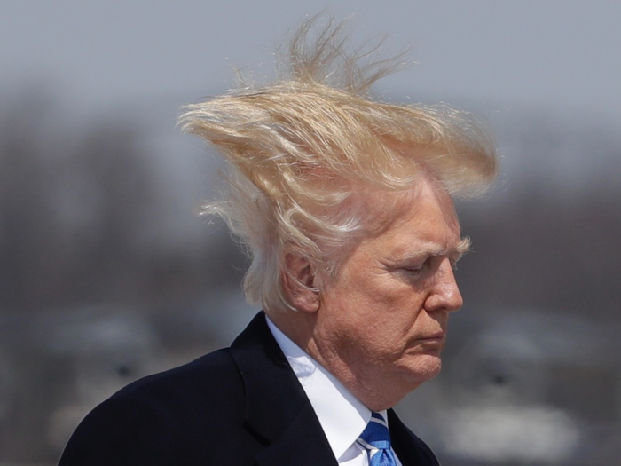 Trump joked about his hair at a speech in February. "I try like hell to hide the bald spot, folks," he told the crowd, patting down the back. "It doesn