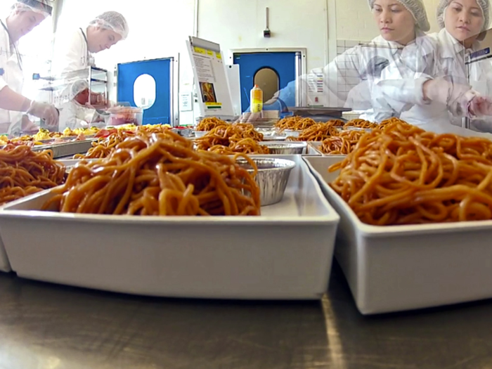 A separate team known as the portion team is dedicated to masking sure meal sizes are exactly the same for each passenger. They have only 45 minutes to portion 1,500 meals, and the food must be kept below 60 degrees Fahrenheit the entire time.