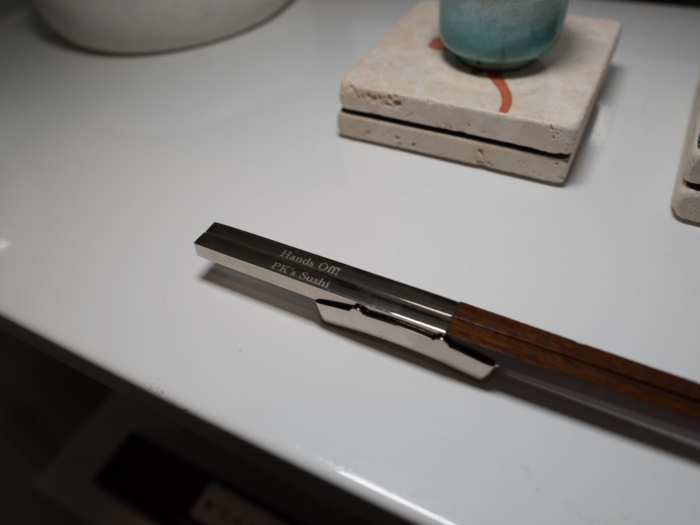 Krim — a self-described "sushi fiend" — keeps customized chopsticks by his desk, too. "It’s been a running joke about how nit picky I am with sharing, so a friend gave me these chopsticks that say 