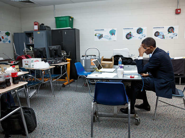 Obama was photographed reviewing his remarks before an especially painful occasion.