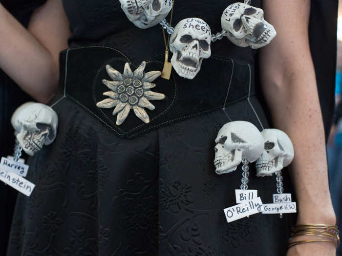 A necklace of skulls represented the male icons swept up in the "Me Too" movement.