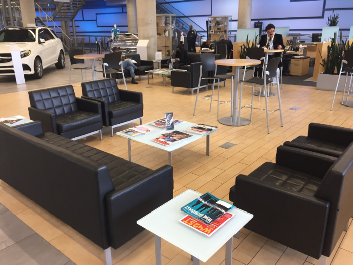 The lounge area also resembles that of a traditional dealership.