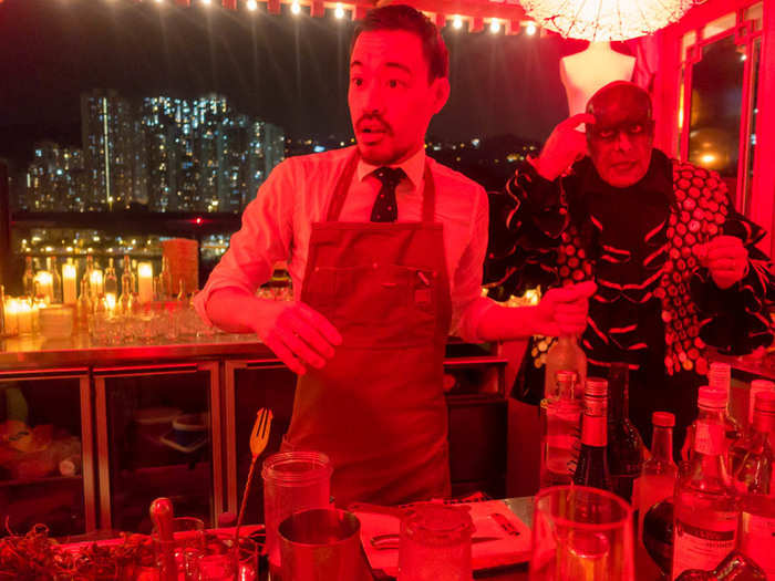 In a small gazebo on the roof, a mixologist was making cocktails themed to the night. Behind him, two costumed actors improv-ed a performance about Dean Lizard, who, in the party