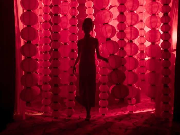 A ballroom stairway carried party-goers to the main party room. But first you had to pass through a curtain of Chinese lanterns.