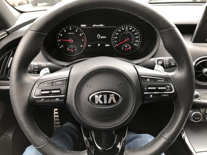 The perforated, leather-wrapped steering wheel is terrific. And what