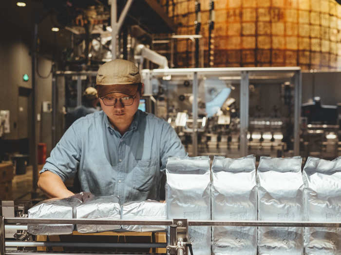 The buzzword around the cafe is that the Roastery is supposed to be "coffee as theater." It certainly feels like it. I saw visitors waiting in front of different machines for them to activate.