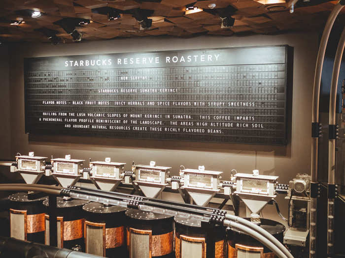 The coffee beans currently roasting are displayed on a large retro board behind the roasting cask. It displays information about taste and origin. Many of the beans are grown in the southwestern province of Yunnan exclusively for the cafe. The region, long known for its tea production, is increasingly growing coffee.