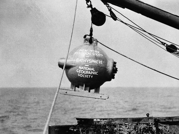 Naturalist William Beebe and engineer Otis Barton created the Bathysphere in 1930. The device was lowered by a cable into the ocean in Bermuda.