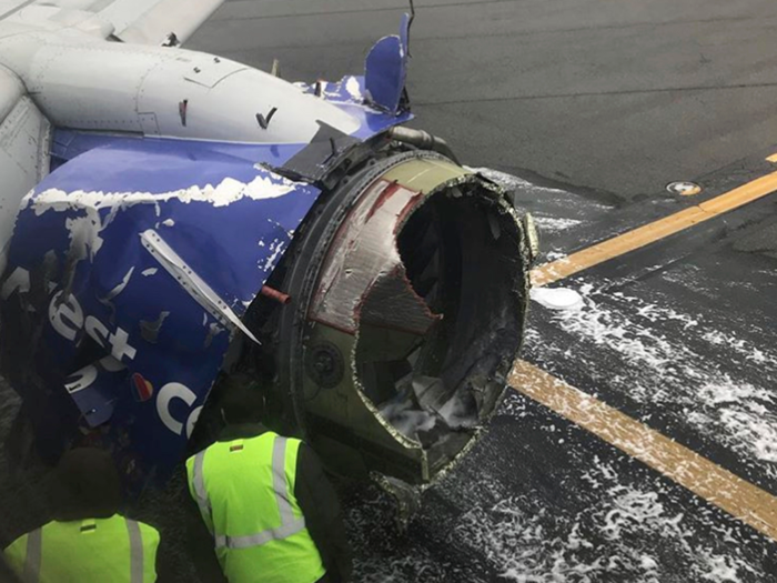 The violent event caused the front cowling of the engine to disintegrate, firing shrapnel into the fuselage of the aircraft.