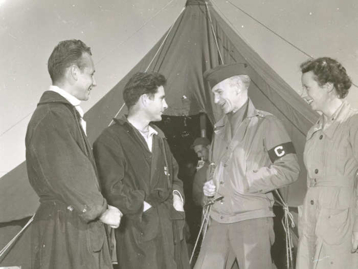 Pyle interviewing Sgt. Ralph Gower, Pvt. Raymond Astrackon and 2nd. Lt. Annette Heaton while attached to an evacuation hospital in North Africa on December 2, 1942.