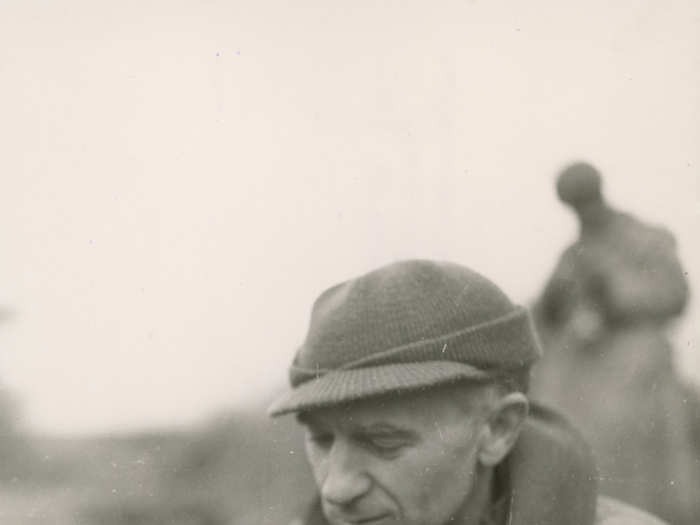 Pyle eating “C” rations in the Anzio Beachhead area, Italy, in March 18, 1944.