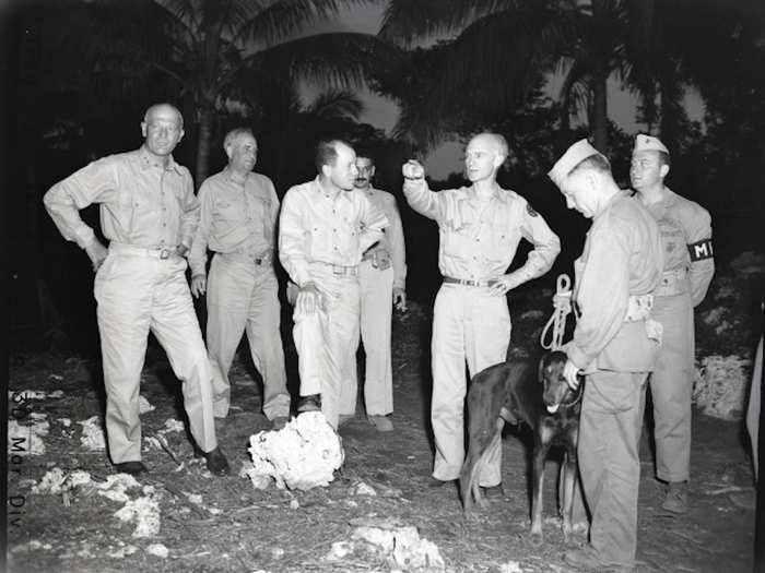 Pyle is shown here talking to Division Commander, Major General Graves B. Erskine on January 22, 1945.