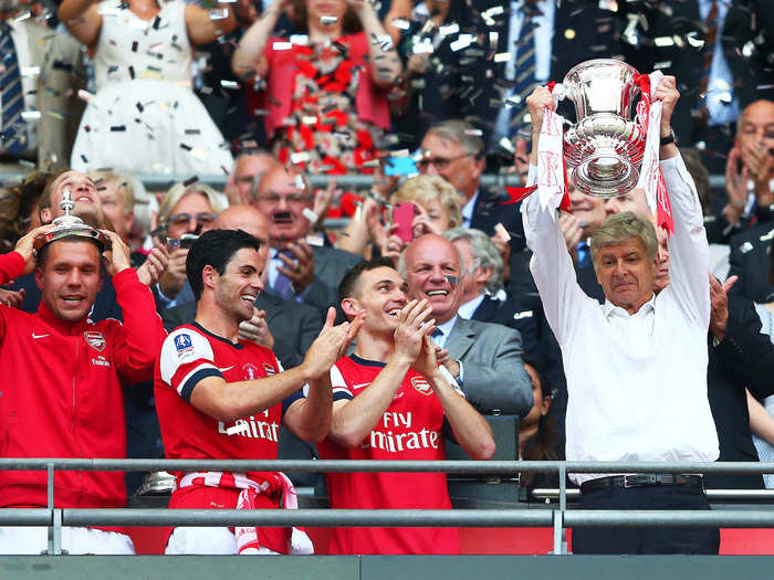 Wenger had silverware in his hands again in 2014, when Arsenal won the FA Cup final — the club