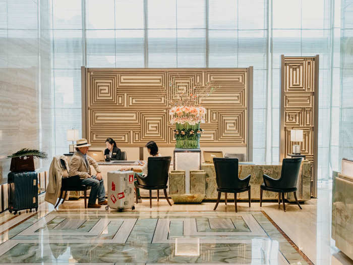 It looked even more luxurious than the main lobby, if that was possible. The floor and walls alternated between a white marble and jade, one of most highly prized stones in Chinese culture.