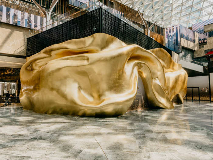 My favorite art at the MGM was "∞ Harmony" by Wang Kaifang, which used wind power and 3D printing to capture "the movement of silk flowing in air." Eighty craftsmen spent 100 days working on 24 tons of stainless steel and 80,000 sheets of 24K gold to create it.