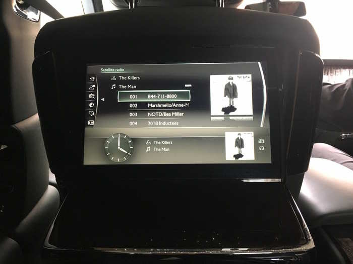 With the push of a button, the table folds down and reveals rear seat infotainment screen. The Phantom is available with a wifi hotspot if you want to do some video streaming.