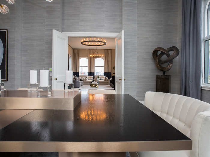 The end of the dining table offers a straight view of uptown and the Empire State Building.