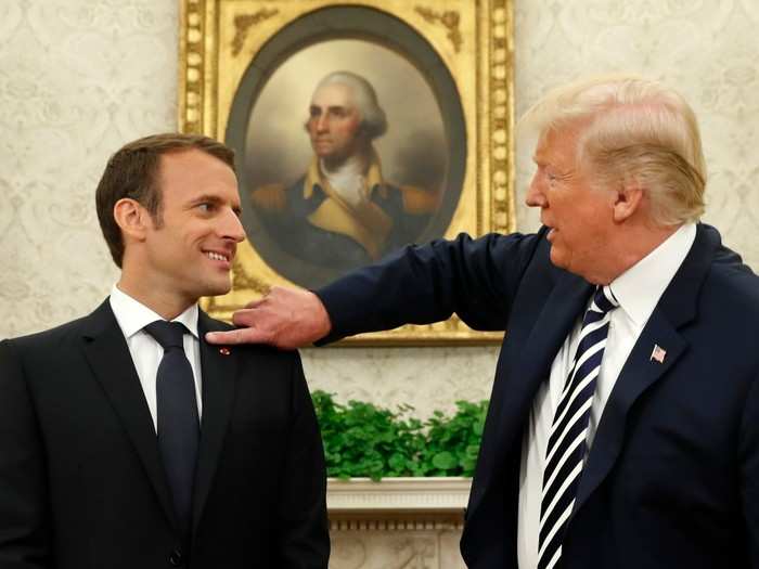 Trump brushed a piece of dandruff off Macron