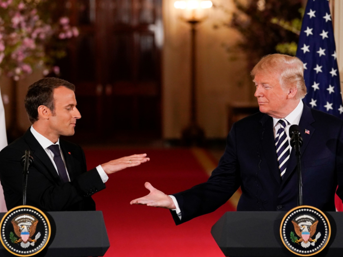 After discussing policy issues, Trump and Macron began a handshake ...