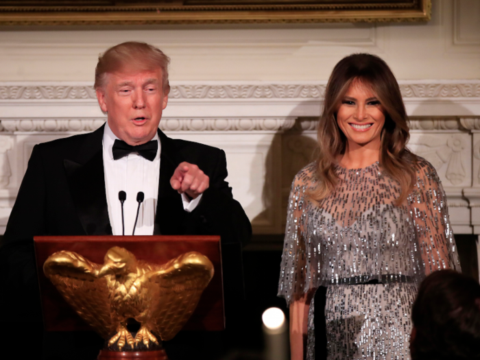 She wore a $8,000 Monique Lhuillier caplet gown during a black tie dinner at the White House.