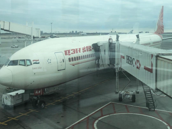 Not too long after that, it was time to board the Boeing 777-300. I felt a surge of patriotism upon spotting the Indian flag. Fun fact: The tail is supposed to be a red flying swan with a "Chakra" in orange inside it — a version of the blue 24-spoked wheel at the center of the flag.