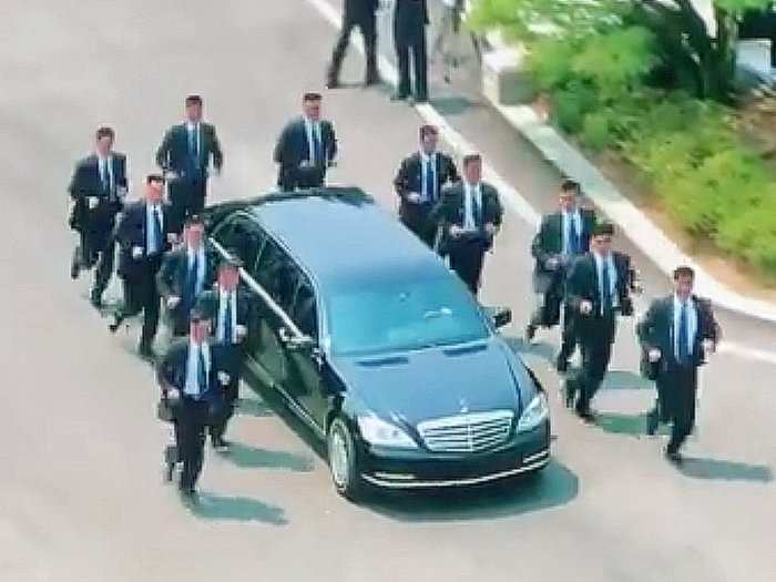 Here's video of Kim Jong Un's bodyguards running in formation next to ...