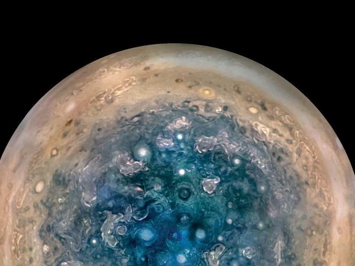 Juno was the first probe to fly above and below Jupiter, photograph the planet