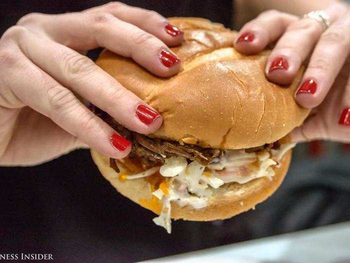 The sandwich is huge and definitely requires two hands to eat with any conceivable amount of dignity.