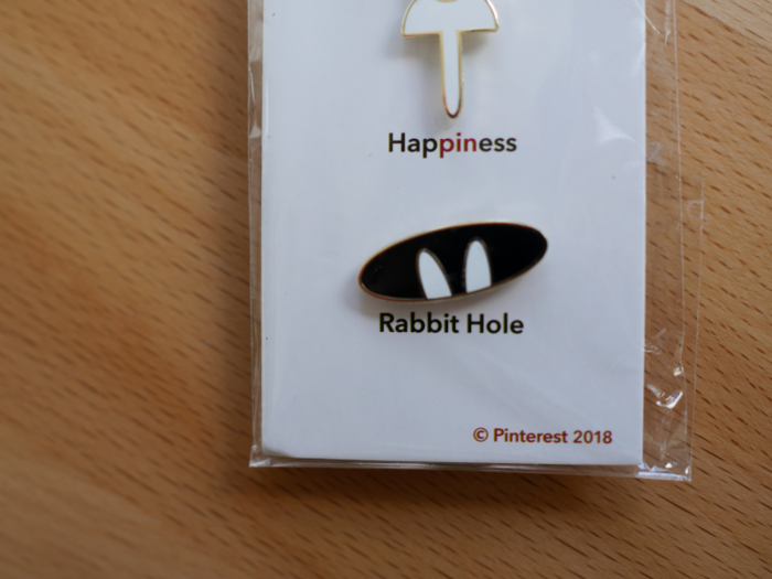 Kare designed these enamel pins for the cafe, her favorite being inspired by the habit Pinterest users develop of being drawn into content on the platform for longer than they planned. Kare said people sometimes hop onto the site with a few minutes of perusing in mind, only to find that they