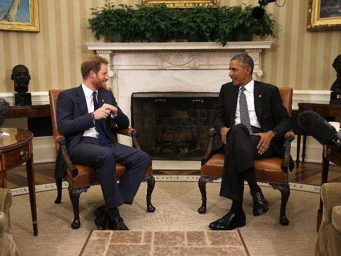 AGE 31. U.S. President Barack Obama meets with Prince Harry in the Oval Office of the White House on October 28, 2015 in Washington, DC.